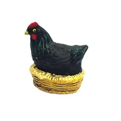 Poule qui couve noire,...