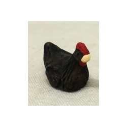 Poule noire qui couve,...