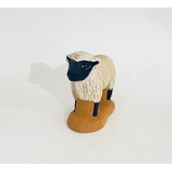 Mouton debout tête noire...