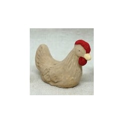 Poule beige qui couve,...