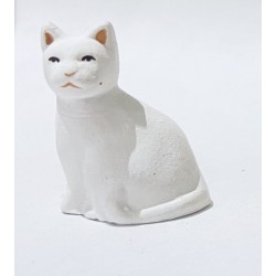 Chat blanc assis, santon...