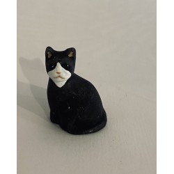 Chat noir assis, santon...