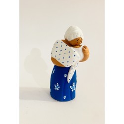 Femme au bébé robe bleue,...